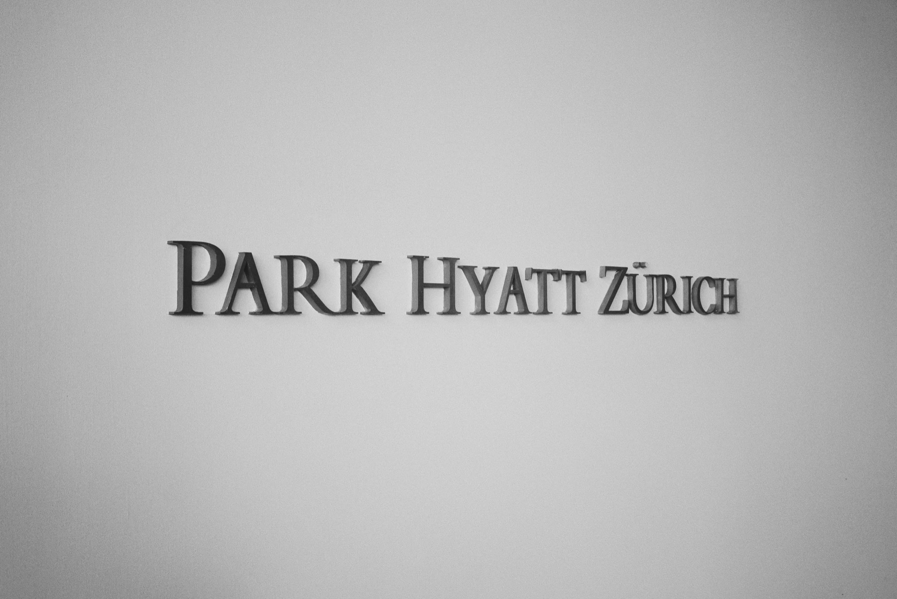 The engraved 'Park Hyatt Zürich' lettering on a pale wall.